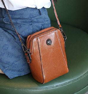 Cowhide Leather Crossbody Bag, Style 2003 in black, brown, ivory
