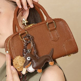 Cowhide Leather Top-Handle Bag, Style 3115 in brown, black, ivory